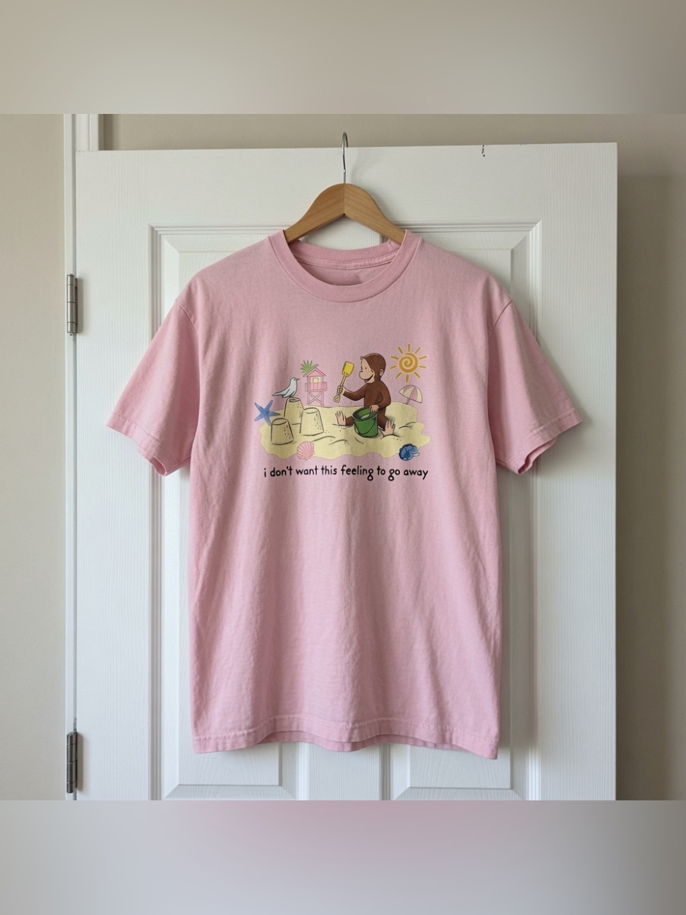 Curious George Beach Sandcastle Light Pink Cute Cartoon Graphic T-Shirt